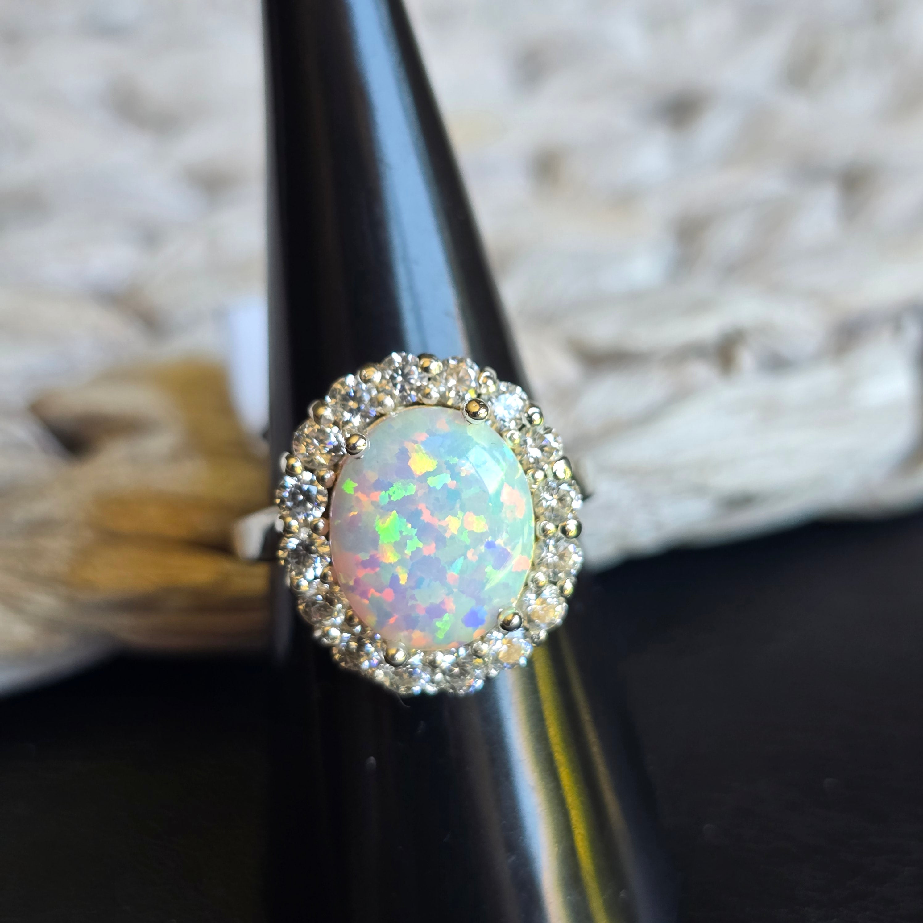 Oval White Opal Halo ring