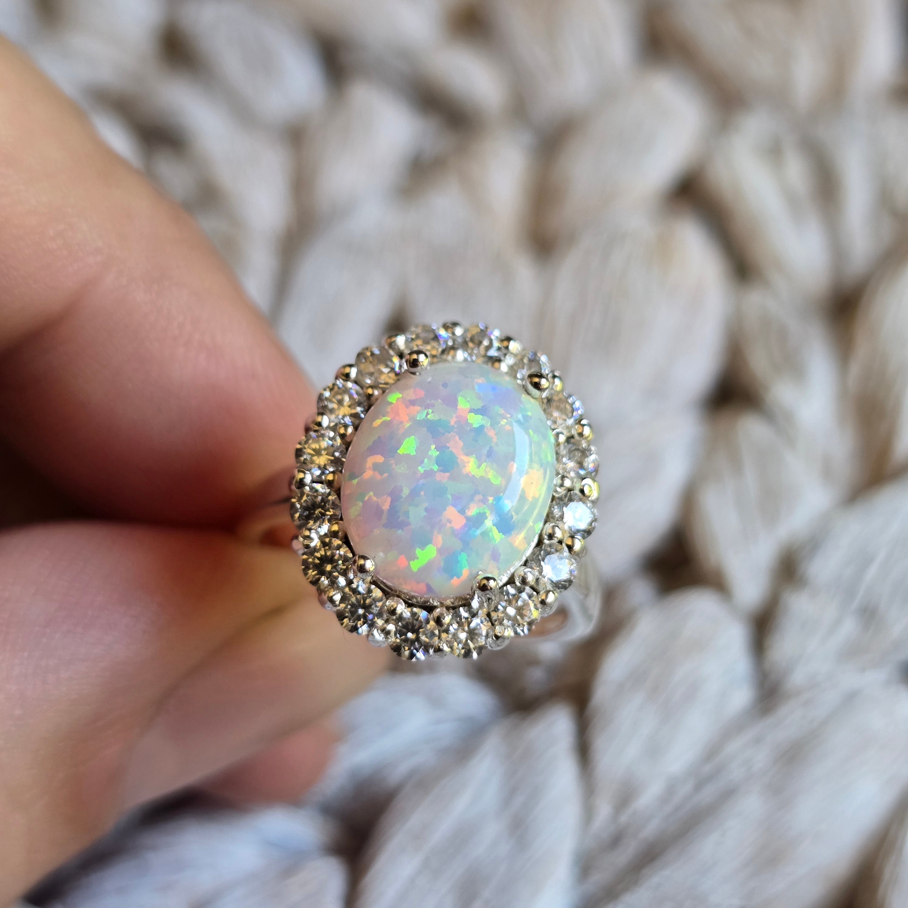 Oval White Opal Halo ring