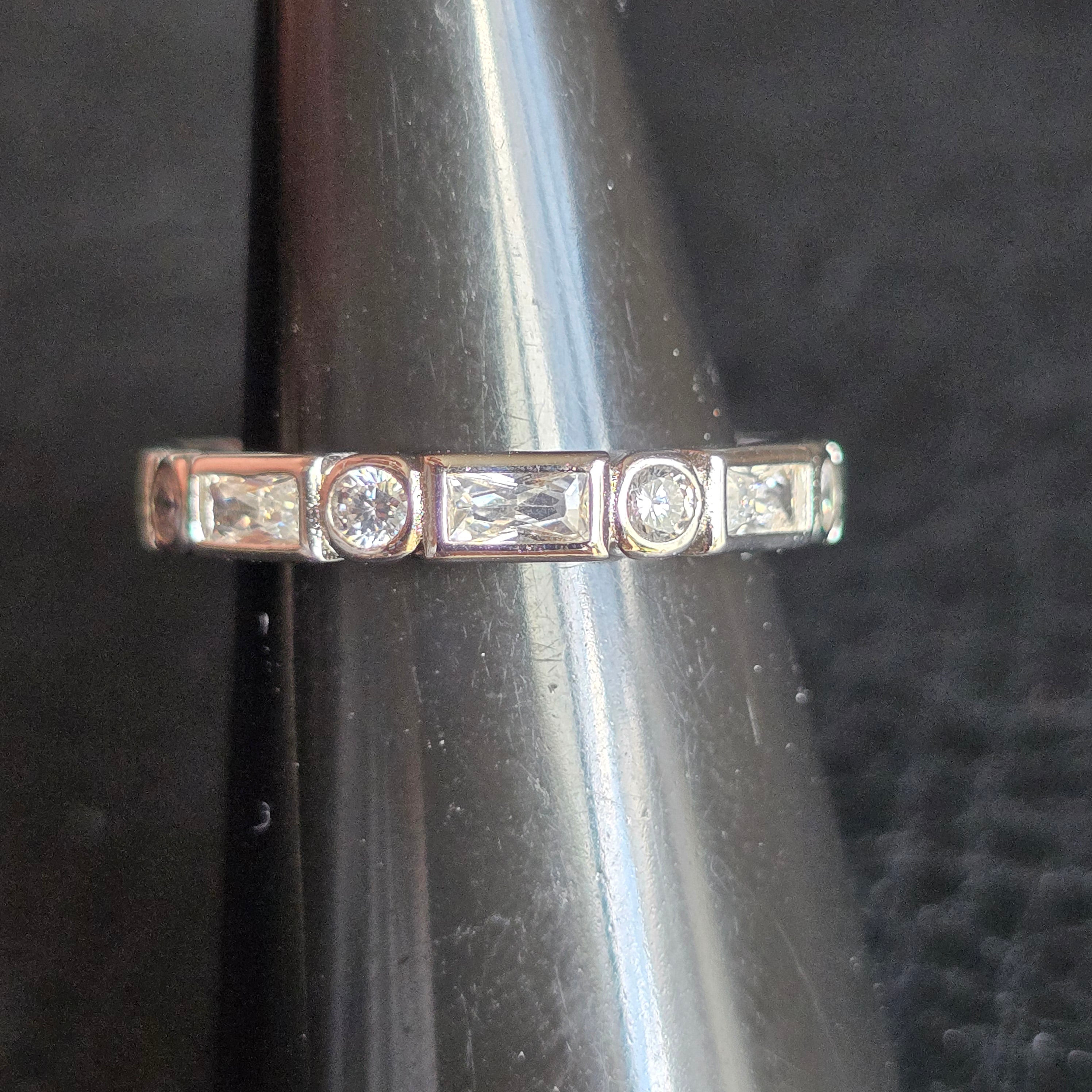 Emerald Round Cut Eternity ring
