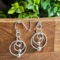 Circle with Ball Dangling earrings