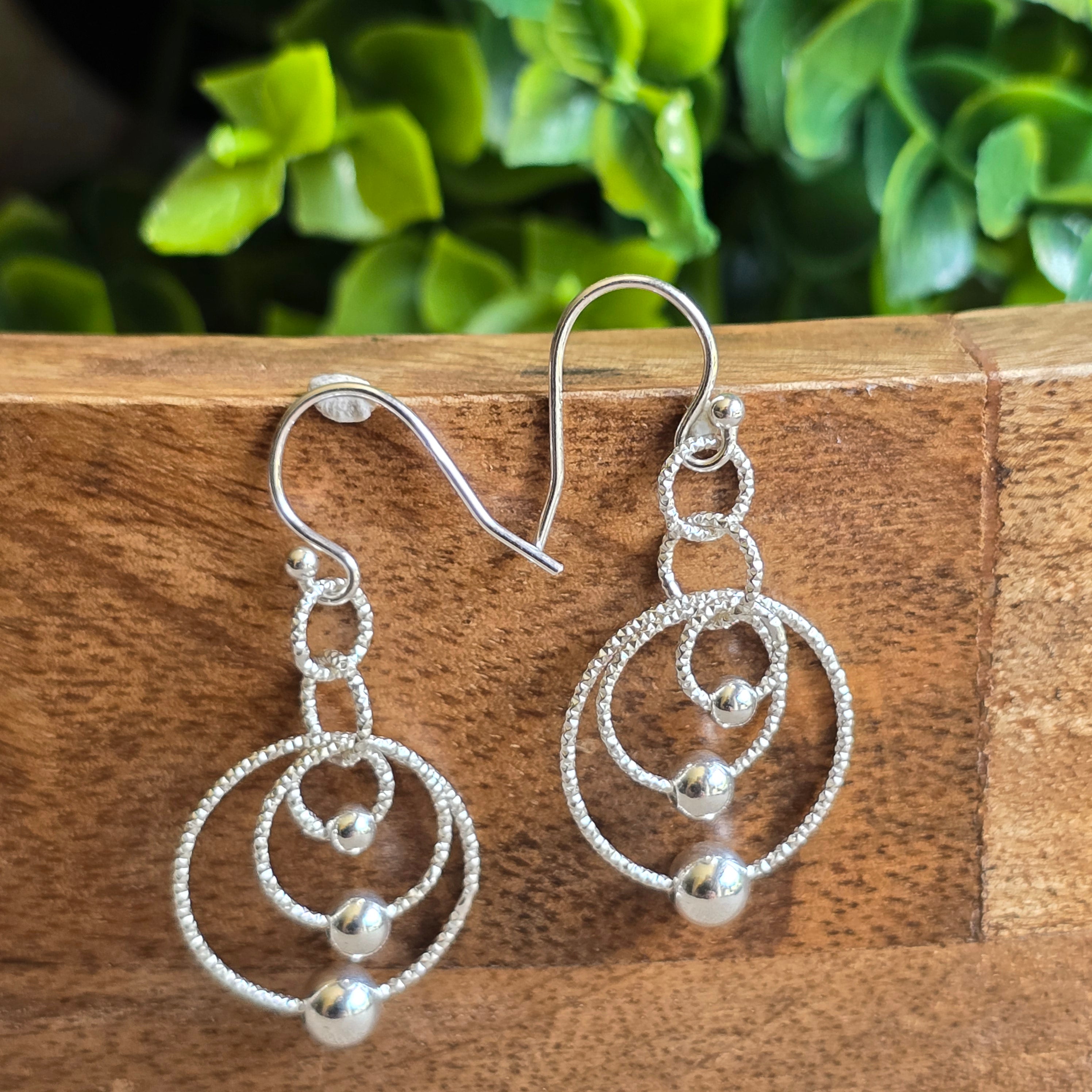 Circle with Ball Dangling earrings
